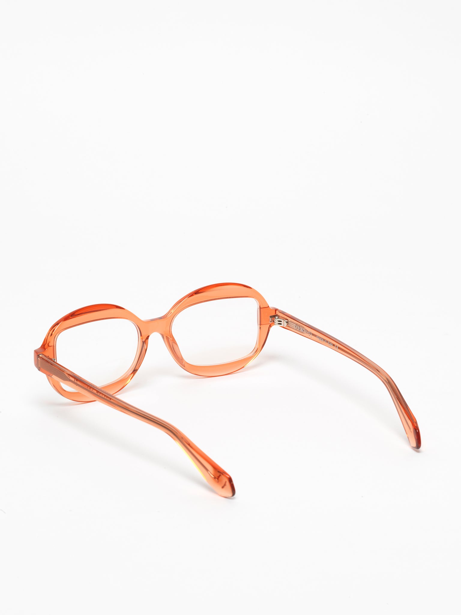 Sensitive unisex eyeglasses by Rewind Eyewear, orange transparent acetate frame