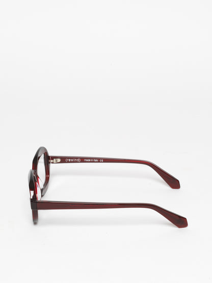 Sensitive unisex eyeglasses by Rewind Eyewear, dark red transparent acetate frame